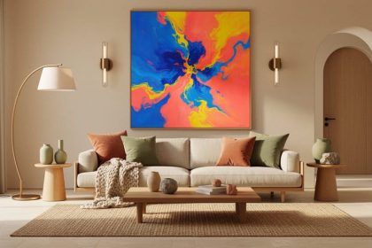 Contemporary living room with a natural-linen sofa, electric-hued abstract artwork, arched doorway, travertine surfaces, and warm oak tones under soft natural daylight.